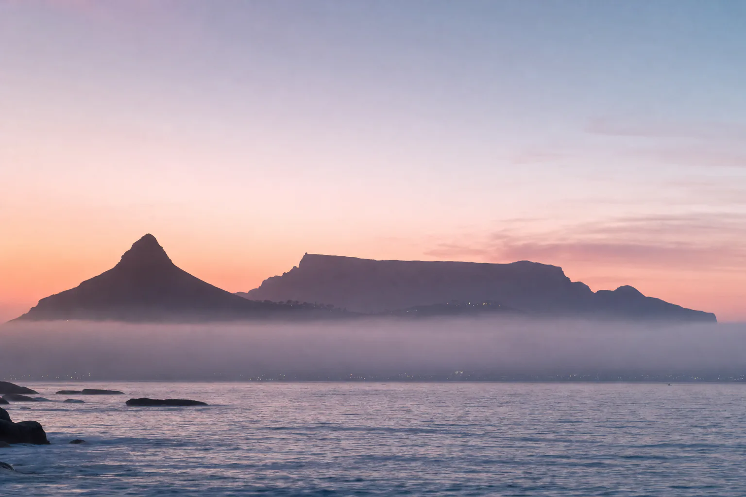 Table Mountain and Lion's Head above sea mist at first light